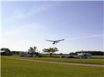 A glider landing at the campground at ADIRONDACK GATEWAY CAMPGROUND - thumbnail