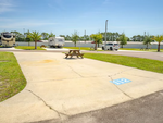 Picnic table on site Pecan Park Sun RV Communities - thumbnail