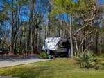 Parked trailer at site Forest Retreat RV Park - thumbnail
