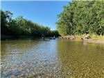 People enjoying the river at SCHROON RIVER CAMPGROUND & LODGING - thumbnail
