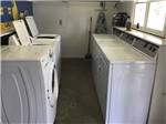 Inside of the clean laundry room at HARVEST MOON RV PARK - thumbnail
