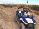 An ATV driving in the desert at SONORAN DESERT RV PARK - thumbnail