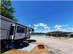A travel trailer by the boat ramp at BIRDSONG RESORT & MARINA LAKESIDE RV & TENT CAMPGROUND - thumbnail