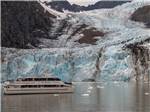 View larger image of View of tour boat next to glacier at STAN STEPHENS GLACIER  WILDLIFE CRUISES image #10