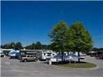 Trucks and trailers parked in sites at HOOVER RV PARK - thumbnail