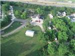 View larger image of An aerial view of the main building at KAMP KOMFORT RV PARK  CAMPGROUND image #1