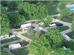 View larger image of An aerial view of the campsites at KAMP KOMFORT RV PARK  CAMPGROUND image #2