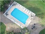 View larger image of An aerial view of the swimming pool at KAMP KOMFORT RV PARK  CAMPGROUND image #3