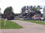 View larger image of A row of gravel pull thru RV sites at KAMP KOMFORT RV PARK  CAMPGROUND image #9