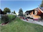 View larger image of Fifth-wheel with big patio and green belt at TRAVERSE BAY RV RESORT image #10