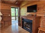 A fireplace in a cabin - thumbnail