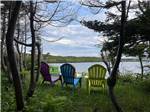 Colorful chairs overlooking the water at VIKING RV PARK - thumbnail