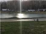 RV sites next to the the lake at MUNCIE RV RESORT BY RJOURNEY - thumbnail