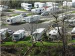 View larger image of An aerial view of the campsites at SANDY RIVERFRONT RV RESORT image #11