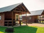 Two cabin rentals with fire pits at WHITETAIL BLUFF CAMP & RESORT - thumbnail