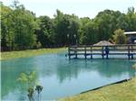 View larger image of A fishing pier on the water at JOLLY ACRES RV PARK  STORAGE image #2