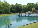 A fishing pier on the water at Jolly Acres RV Park & Storage - thumbnail