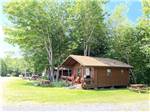 View larger image of A row of rental cabins at ADVENTURES EAST CAMPGROUND  COTTAGES image #12