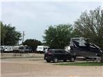 RV sites with dinghy vehicle at TEXAN RV RANCH - thumbnail