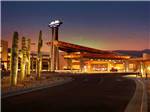 View larger image of The front entrance of the casino at dusk at EAGLE VIEW RV RESORT ASAH GWEH OOU-O AT FORT MCDOWELL image #1