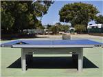 A blue ping pong table at MISSION BAY RV RESORT - thumbnail