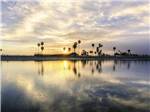 View larger image of The sunset over the water at MISSION BAY RV RESORT image #12