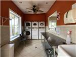View larger image of The laundry room with washer and dryers at CAMPING LA CLE DES CHAMPS RV RESORT image #5