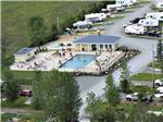 An aerial view of the swimming pool at CAMPING LA CLE DES CHAMPS RV RESORT - thumbnail
