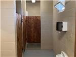 View larger image of The bathroom stalls with a window at FISHBERRY CAMPGROUND image #12
