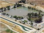 Aerial view of the lake and RV sites at REFLECTION LAKE RV PARK & CAMPGROUND - thumbnail