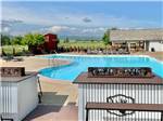 The pool and lounge area at Elkhorn Ridge RV Resort & Cabins - thumbnail