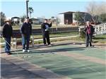 View larger image of People playing shuffleboard at LAZY PALMS RANCH RV PARK image #5