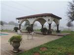 View larger image of The pavilion by the swimming pool at LAZY PALMS RANCH RV PARK image #7