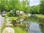 Paved road near the pond at PINEHIRST RV RESORT - thumbnail