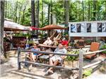 Patio area with picnic table at SANDY BEACH CAMPGROUND - thumbnail