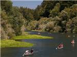 People canoeing down a river at SONOMA COUNTY RV PARK-AT THE FAIRGROUNDS - thumbnail