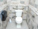 View of the toilet in the restroom at HERITAGE ACRES RV PARK - thumbnail