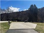 A paved RV site with patio and picnic table at Klamath Ranch Resort / Blue Heron RV Park - thumbnail