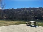 A view of the hills from a paved RV site at Klamath Ranch Resort / Blue Heron RV Park - thumbnail