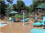 View larger image of The water splash pad by the pool at TWIN FOUNTAINS RV RESORT image #7