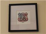 View larger image of A piece of artwork of a Route 66 sign at OAK GLEN RV PARK image #12