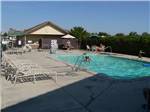 View larger image of People swimming in pool at FLAG CITY RV RESORT image #4
