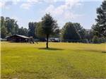 The playground and volleyball net at DAN RIVER CAMPGROUND - thumbnail