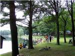 Campers enjoying the lake at WAUBEEKA FAMILY CAMPGROUND - thumbnail
