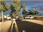 A row of gravel RV sites at TWIN PINES RV PARK & CAMPGROUND - thumbnail