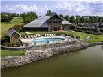The swimming pool overlooking the river at TWO RIVERS LANDING RV RESORT - thumbnail