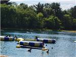 View larger image of Fun toys in the water at CHAPPARAL CAMPGROUND  RESORT image #4
