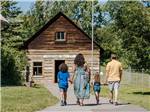 View larger image of A family walking towards a building at GRANDE PRAIRIE REGIONAL TOURISM ASSOCIATION image #3