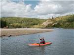 A man kayaking in the river at GRANDE PRAIRIE REGIONAL TOURISM ASSOCIATION - thumbnail