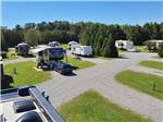 View larger image of The gravel road between campsites at THE RV RESORT AT CAROLINA CROSSROADS image #3